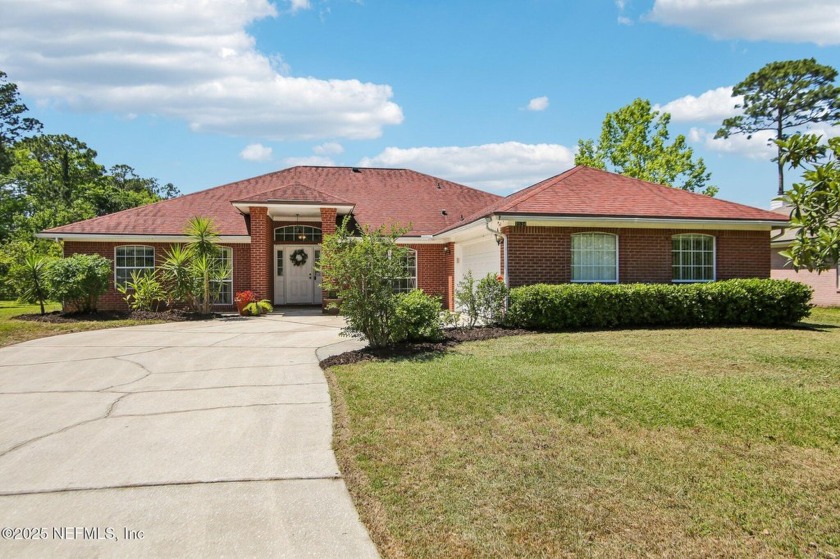 Discover the potential in this charming brick home, nestled in - Beach Home for sale in Fleming Island, Florida on Beachhouse.com