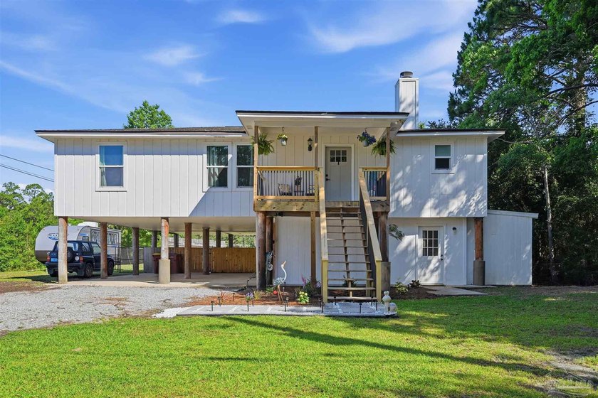 Waterfront living on Trout Bayou with your boat in the backyard - Beach Home for sale in Milton, Florida on Beachhouse.com