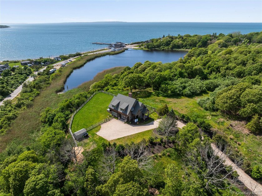 Elegant Montauk Retreat With Sunset Water Views. Privately set - Beach Home for sale in Montauk, New York on Beachhouse.com