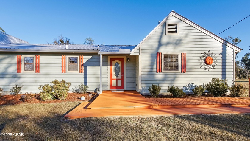 Tucked away on a gorgeous 2-acre homesite, this inviting - Beach Home for sale in Panama City, Florida on Beachhouse.com