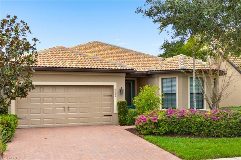 WATERFRONT LIVING in Del Webb Naples! Wake up each day to - Beach Home for sale in Ave Maria, Florida on Beachhouse.com