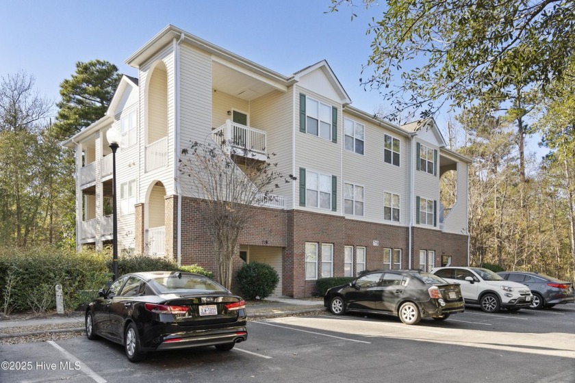 Experience tranquil living in this very spacious 3 bedroom,  2 - Beach Condo for sale in Wilmington, North Carolina on Beachhouse.com