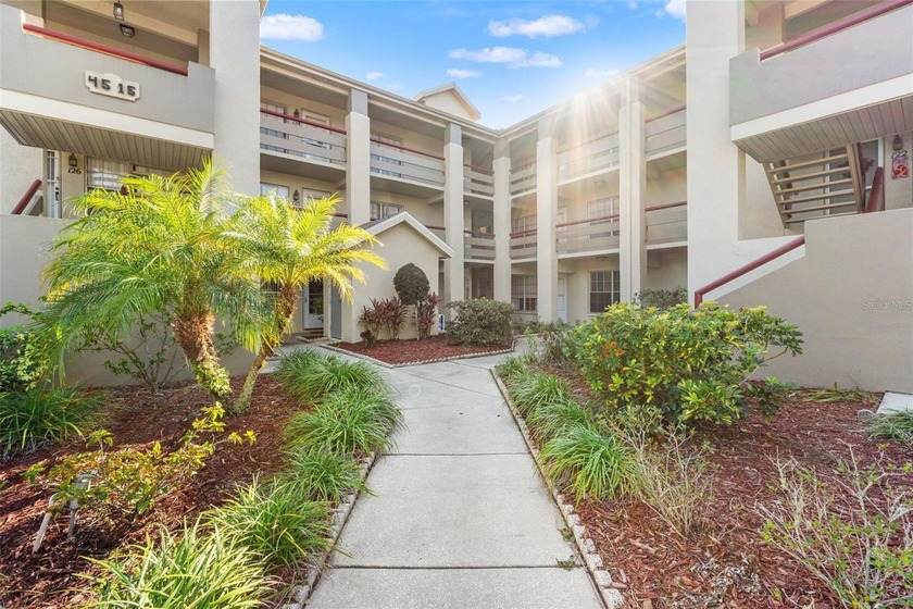 Welcome to this inviting 3-bedroom, 2-bath, second floor condo - Beach Condo for sale in New Port Richey, Florida on Beachhouse.com