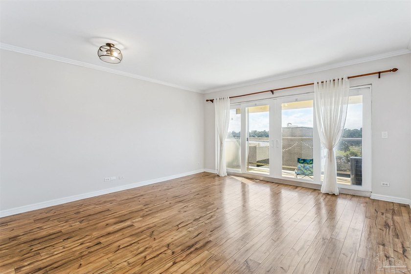 Live where others vacation in this lovely one-bedroom - Beach Condo for sale in Pensacola, Florida on Beachhouse.com