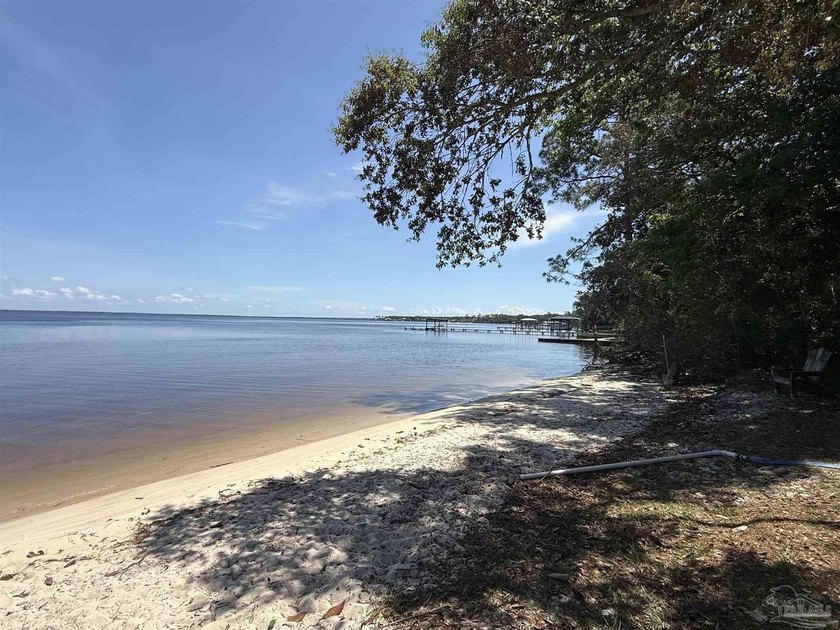 Experience waterfront living at its finest in this one-of-a-kind - Beach Home for sale in Pensacola, Florida on Beachhouse.com