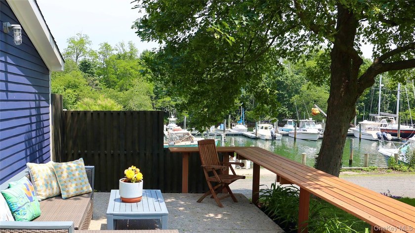 Water view meticulously renovated 3 bedroom 2-bath corner home - Beach Home for sale in Greenport, New York on Beachhouse.com