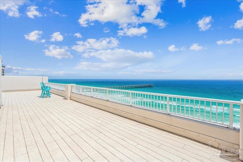 Set high above the sugar-white sands of Navarre Beach, this - Beach Condo for sale in Navarre Beach, Florida on Beachhouse.com