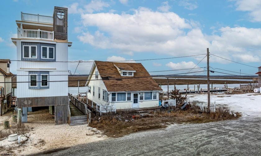 This waterfront oasis offers endless opportunity to create your - Beach Home for sale in Strathmere, New Jersey on Beachhouse.com