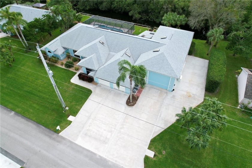 Perfect home for you and your toys! This custom pool home on a - Beach Home for sale in Sebastian, Florida on Beachhouse.com