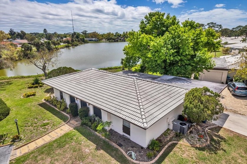 Long Lake view, from this free standing Villa. 2 bedrooms, 2 - Beach Condo for sale in Nokomis, Florida on Beachhouse.com