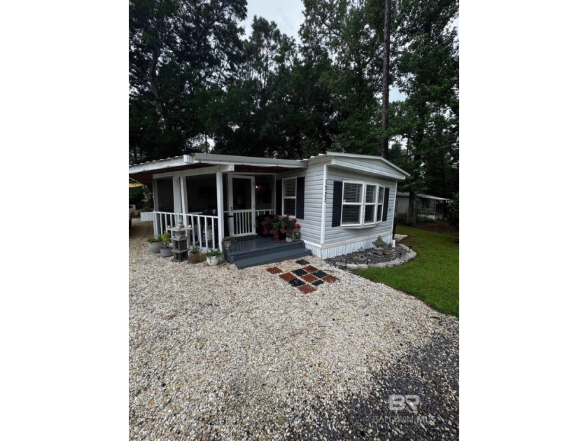 Welcome to this beautifully updated coastal cottage with RV and - Beach Home for sale in Lillian, Alabama on Beachhouse.com