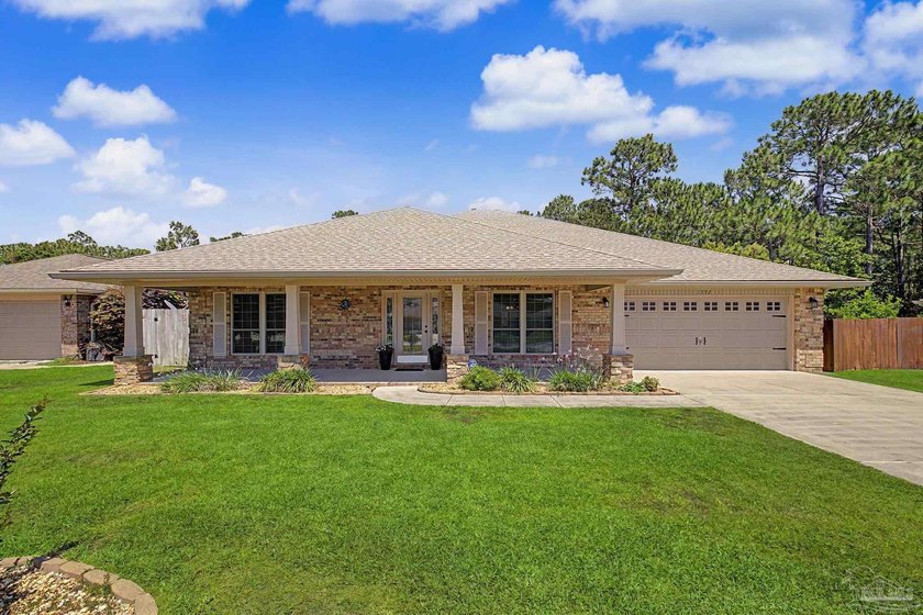 Located in the highly desirable Summerset Estates community of - Beach Home for sale in Gulf Breeze, Florida on Beachhouse.com
