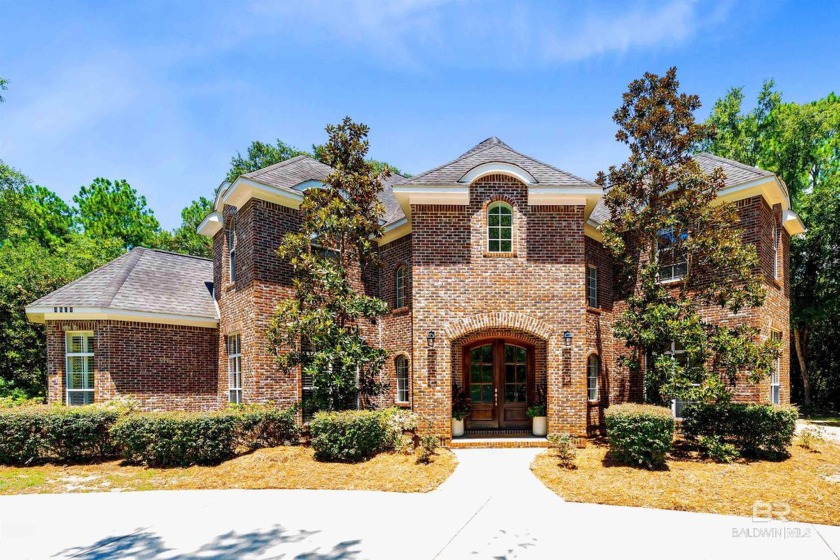 Nestled within the sought-after Martyn Woods neighborhood, this - Beach Home for sale in Gulf Shores, Alabama on Beachhouse.com