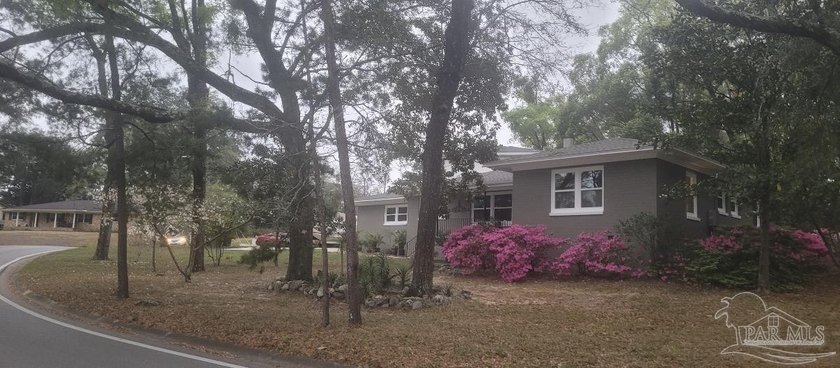 This classic mid century ranch home offers the perfect blend of - Beach Home for sale in Pensacola, Florida on Beachhouse.com