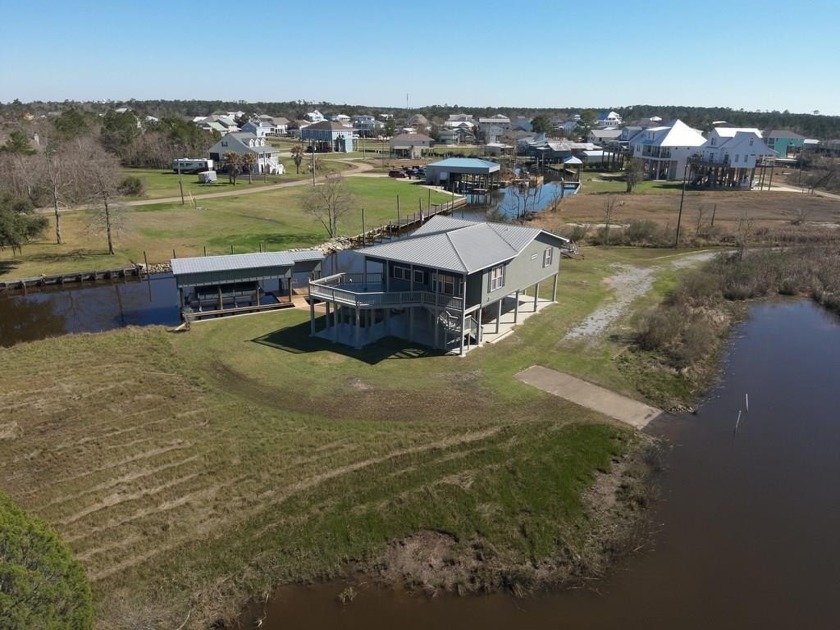 Escape to your own slice of paradise with this beautifully - Beach Home for sale in Bay Saint Louis, Mississippi on Beachhouse.com