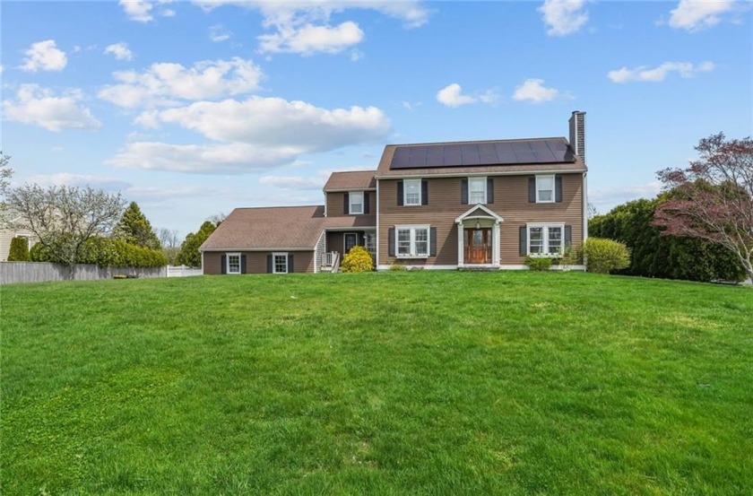 Welcome to 101 Windstone Drive, perfectly situated on a half of - Beach Home for sale in Portsmouth, Rhode Island on Beachhouse.com
