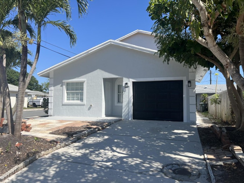 Come see this newly renovated 2-story family home with 4 - Beach Home for sale in Lake Worth Beach, Florida on Beachhouse.com
