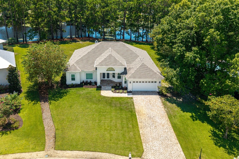 Situated on a spacious 1/2 acre lot boasting 177 ft of lake - Beach Home for sale in Santa Rosa Beach, Florida on Beachhouse.com