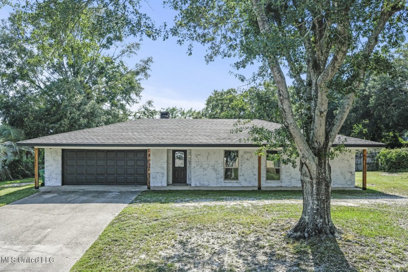 One-story brick home with beautiful waterfront access - Beach Home for sale in Ocean Springs, Mississippi on Beachhouse.com