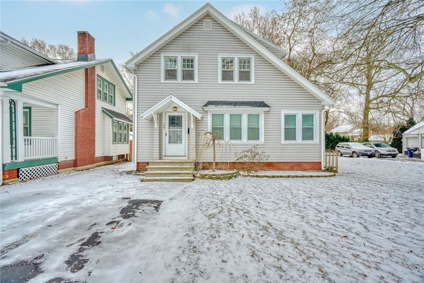 Beautiful vinyl sided Colonial on a mature treed street! Large - Beach Home for sale in Irondequoit, New York on Beachhouse.com