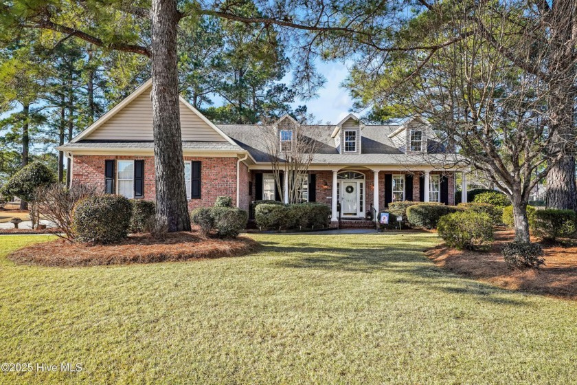 One level home situated on a lot backing to the golf course and - Beach Home for sale in Leland, North Carolina on Beachhouse.com