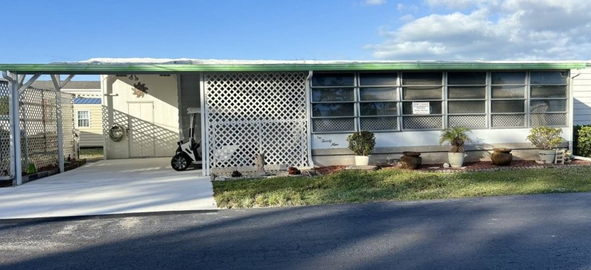 This spacious 1,152 sq ft manufactured home nestled on a - Beach Home for sale in Sebastian, Florida on Beachhouse.com