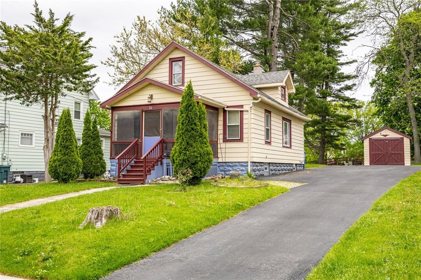 This charming home is nestled in Rochester's beloved Charlotte - Beach Home for sale in Rochester, New York on Beachhouse.com