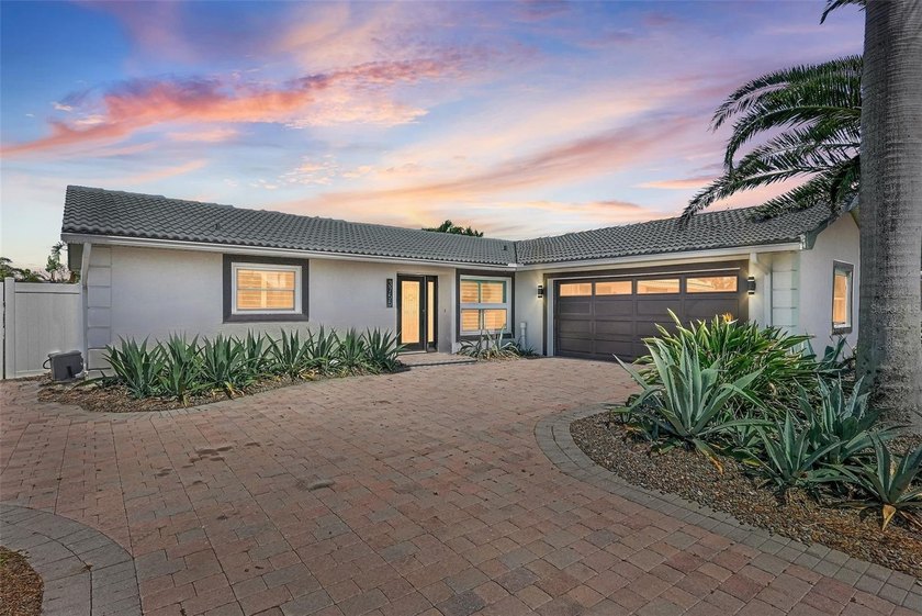 Modern coastal living comes to life in this beautifully updated - Beach Home for sale in ST Pete Beach, Florida on Beachhouse.com