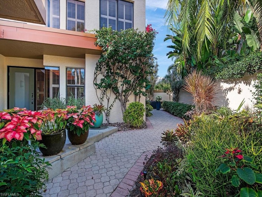 A rare opportunity awaits to own a modern-style villa that lives - Beach Home for sale in Naples, Florida on Beachhouse.com