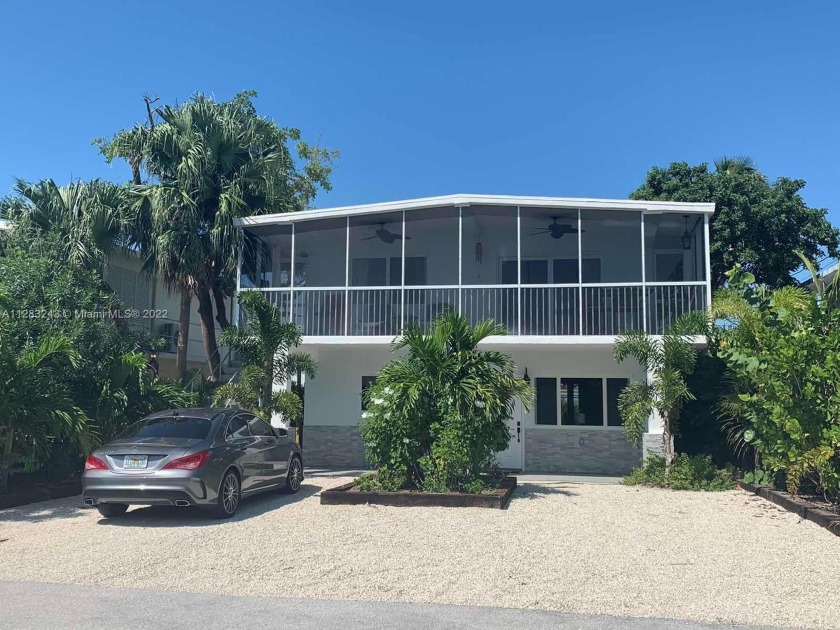 GORGEOUS WATERVIEWS OCEAN SIDE! 3/2 TROPICAL GEM AT LARGO - Beach Home for sale in Key  Largo, Florida on Beachhouse.com