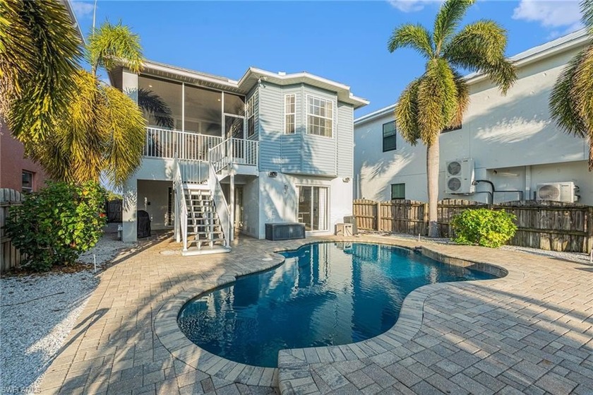 This gorgeous waterfront pool home would be ideal as a primary - Beach Home for sale in Apollo Beach, Florida on Beachhouse.com