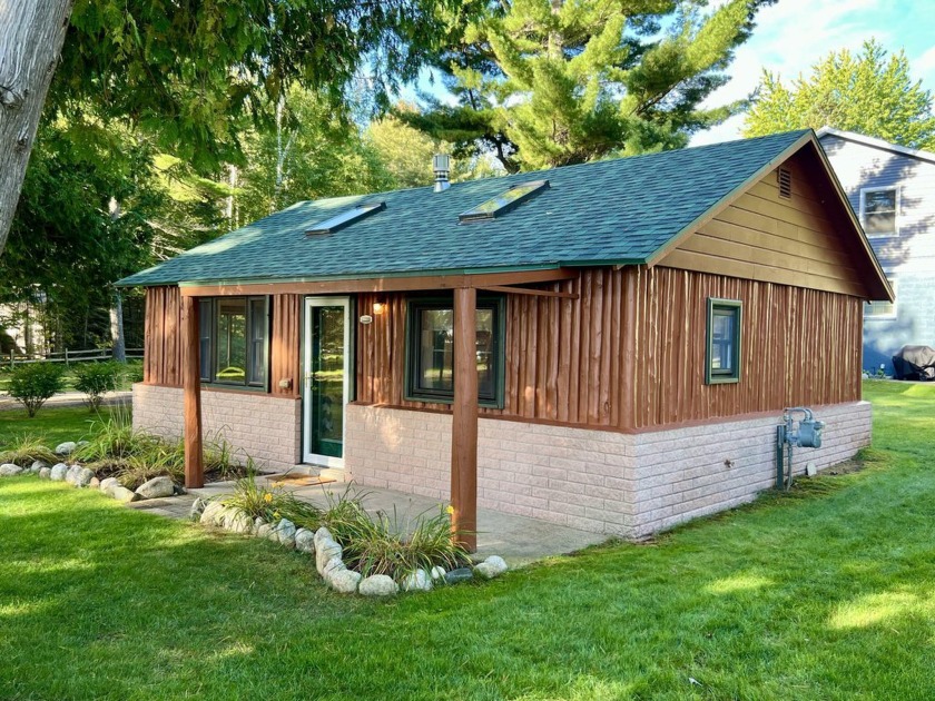 Looking for a renovated cozy lakeshore cabin with the best sandy - Beach Home for sale in Cheboygan, Michigan on Beachhouse.com