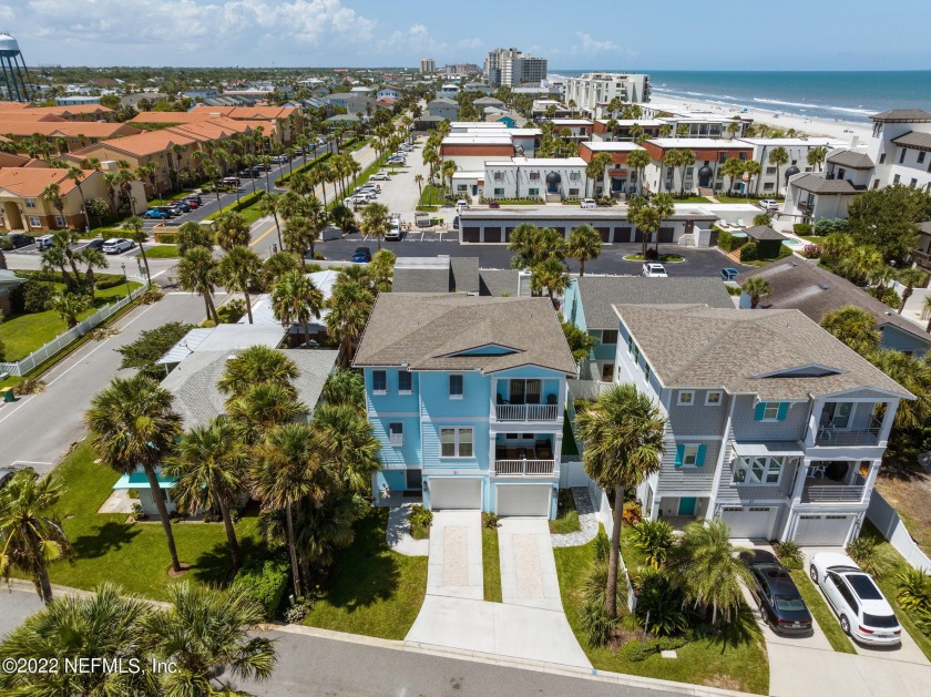 Just steps from the sand, this 3-story coastal residence, built - Beach Home for sale in Jacksonville Beach, Florida on Beachhouse.com