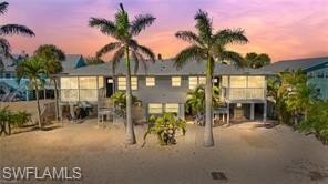 Rarely offered 4-unit QUAD in the weekly rental zone -- Sun - Beach Townhome/Townhouse for sale in Fort Myers Beach, Florida on Beachhouse.com