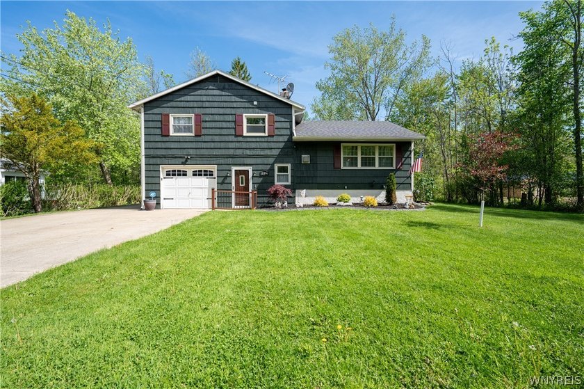 Welcome to this beautifully updated move-in ready multi-level - Beach Home for sale in Angola, New York on Beachhouse.com