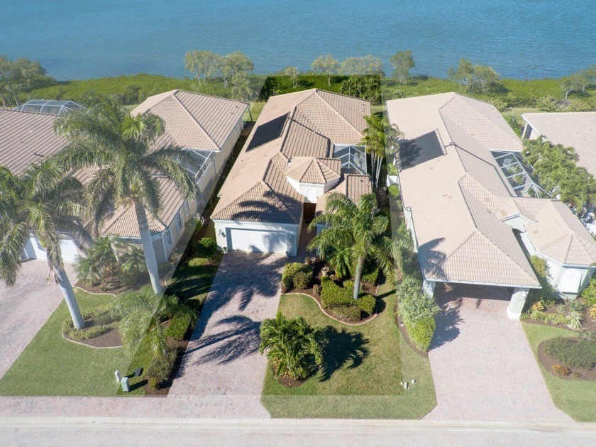 WHAT A VIEW! 3 BD/3 BA courtyard pool home. Open concept w/ tile - Beach Home for sale in Hutchinson Island, Florida on Beachhouse.com