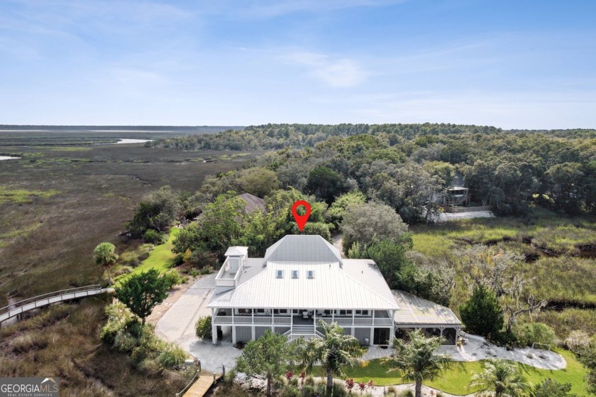 Experience luxury living at its finest in this breathtaking St - Beach Home for sale in Saint Marys, Georgia on Beachhouse.com