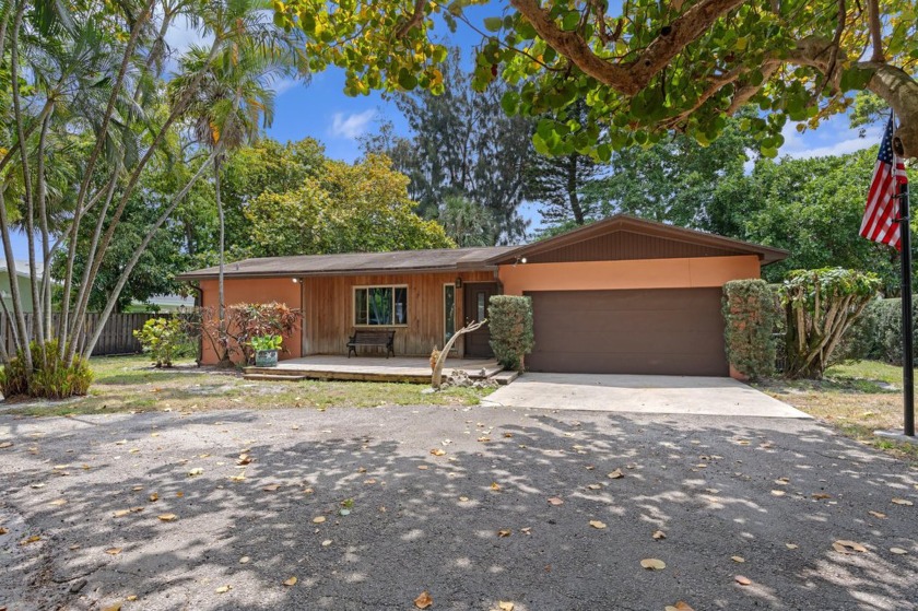 Situated on over a third of an acre is this 2 bedroom 2 bath non - Beach Home for sale in Palm Springs, Florida on Beachhouse.com