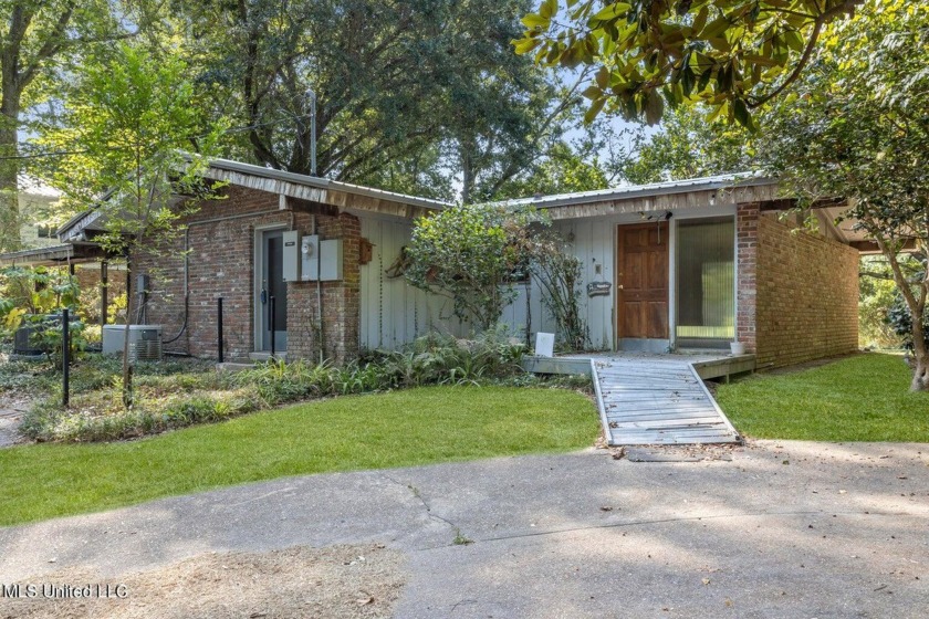 Built by Carroll Ishee in 1960 this home retains it's cork - Beach Home for sale in Ocean Springs, Mississippi on Beachhouse.com