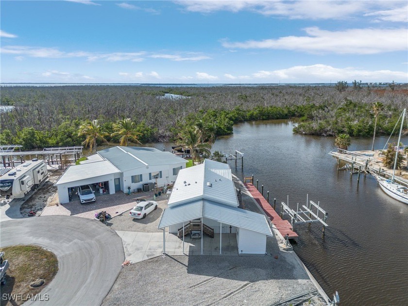 Are you searching for a boating community with quick Gulf of - Beach Home for sale in St. James City, Florida on Beachhouse.com