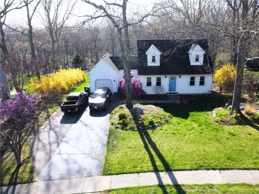 This great Cape Cod is nestled in the popular Tefft Hill - Beach Home for sale in South Kingston, Rhode Island on Beachhouse.com