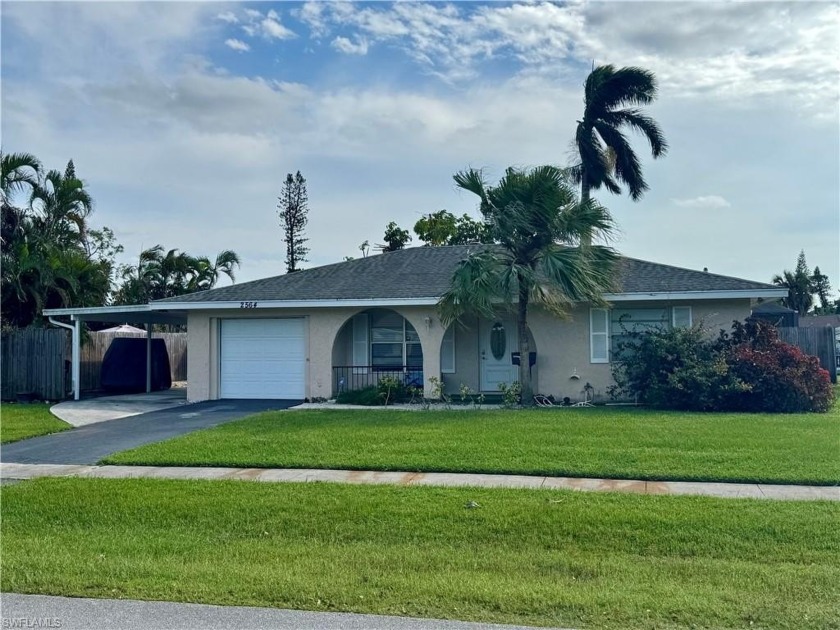 Charming pool home nestled in the neighborhood of Poinciana - Beach Home for sale in Naples, Florida on Beachhouse.com