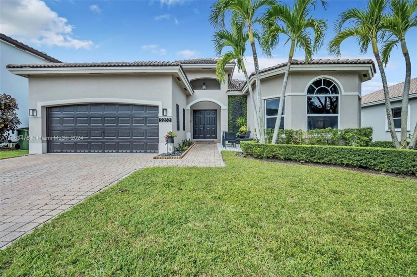 Stunning lake-front home perfectly nestled in the exclusive Keys - Beach Home for sale in Homestead, Florida on Beachhouse.com