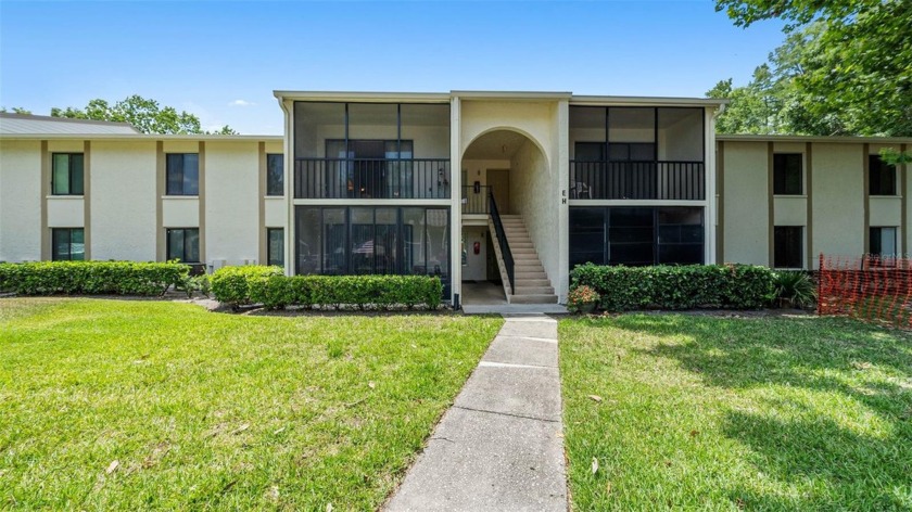 Nestled in the serene Deer Hollow community at Pine Ridge at - Beach Condo for sale in Tarpon Springs, Florida on Beachhouse.com