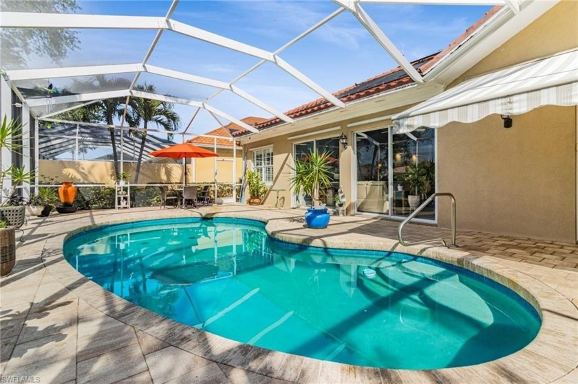 Welcome to this stunning single-family pool home nestled in the - Beach Home for sale in Bonita Springs, Florida on Beachhouse.com