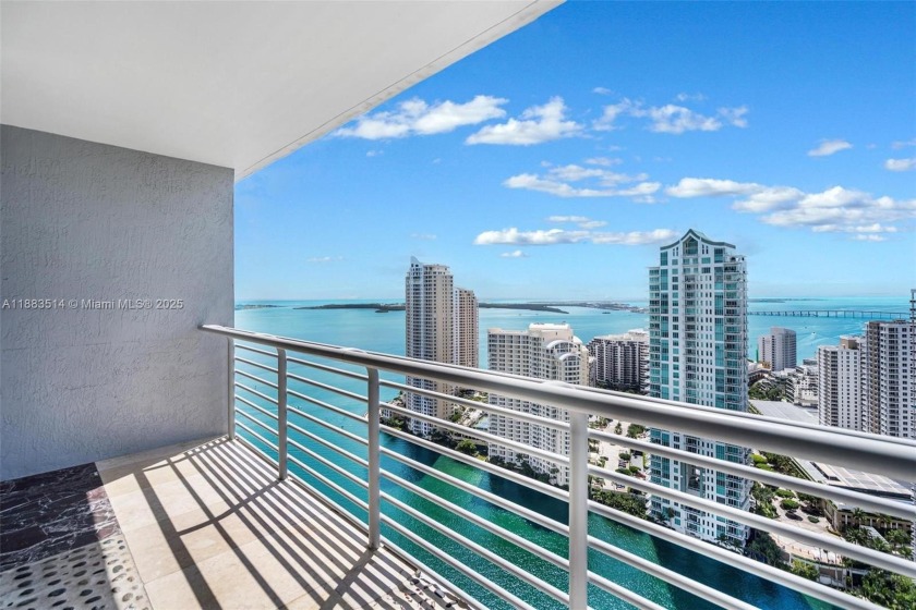 REDUCED! This 2/2 condo with unobstructed bay/ocean views that - Beach Condo for sale in Miami, Florida on Beachhouse.com