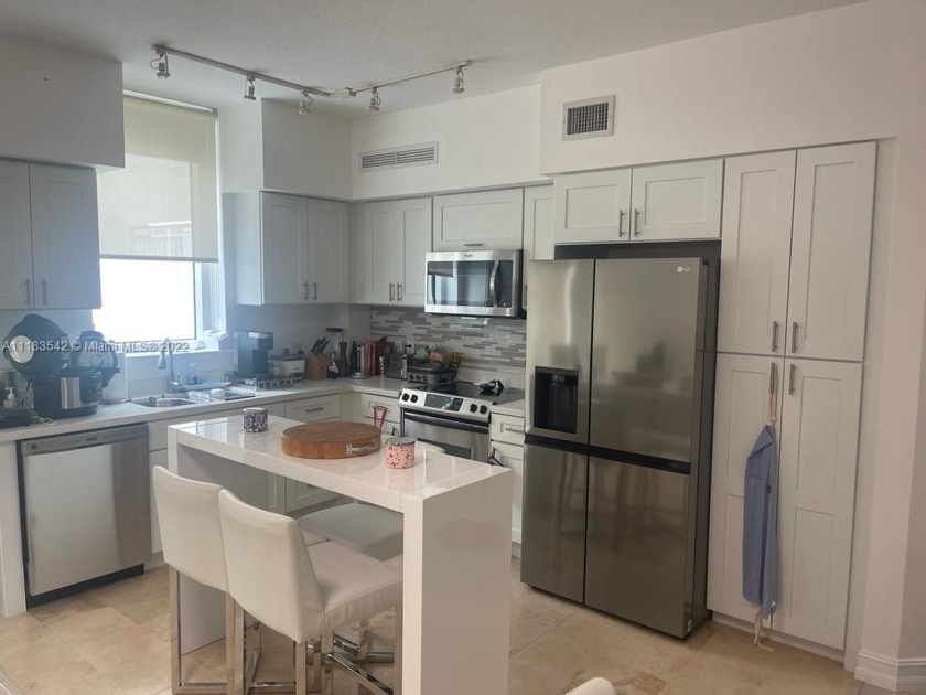 BEAUTIFUL AND SPACIOUS 2/2 UNIT. REMODELED KITCHEN AND FLOORS - Beach Condo for sale in Hallandale Beach, Florida on Beachhouse.com
