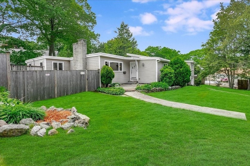Midcentury modern style and coastal charm come together in this - Beach Home for sale in Swampscott, Massachusetts on Beachhouse.com