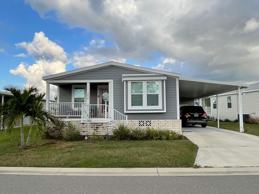 Welcome to your ideal home nestled in the highly coveted 55+ - Beach Home for sale in Ellenton, Florida on Beachhouse.com