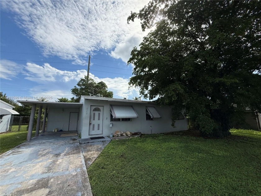 Fixer-Upper with Huge Potential. This 4-bed, 2-bath home has two - Beach Home for sale in Riviera Beach, Florida on Beachhouse.com